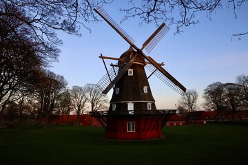 Obraz premium dutch windmill at sunset in Copenhagen Denmark