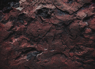 Brown wall texture. Stone background. Rock texture. Grunge Rough structure. Abstract texture. Rock surface with cracks. Rock pile. Paint spots.