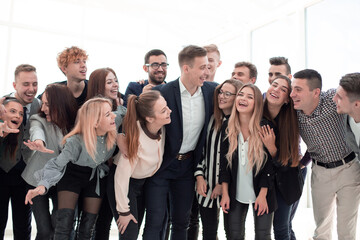 team of cheerful young people looking at the camera