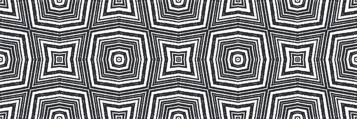 Ethnic hand painted seamless border. Black