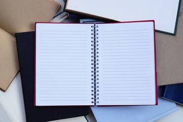 Notebooks on paper background. Top view