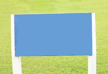 Blank sign on garden background.