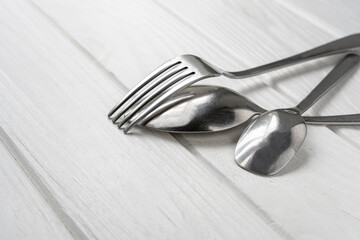 Cutlery. Spoon, filk, teaspoon on the table
