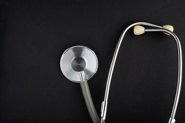Stethoscope isolated on black background. medical instrument