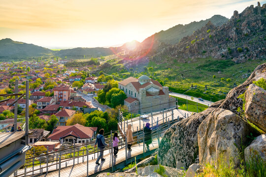 Sivrihisar, Eskisehir, Turkey - May 8 2022: Aerial view of Sivrihisar city with Surp Yerrortutyun Armenian Church at sunset with tourists.