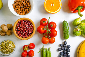 Different vegetables and fruits on an old background