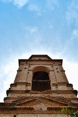 Naklejka premium Brick bell tower of the church