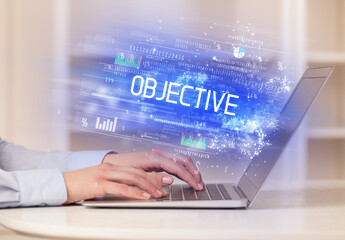 Closeup of businessman hands working on laptop