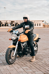 Fototapeta na wymiar person riding a motorcycle