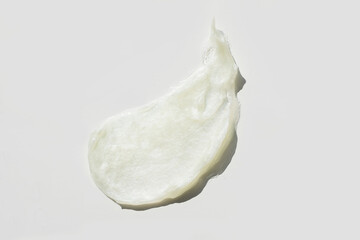 Top view of the cosmetic cream on white background, different swatches. Pastel colors. Good as cosmetics mockup