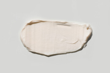 Top view of the cosmetic cream on white background, different swatches. Pastel colors. Good as cosmetics mockup