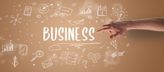 Close-Up of cropped hand pointing at business inscription