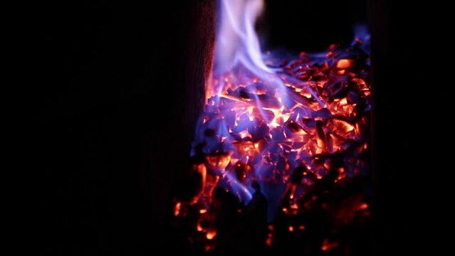 Flame on coal burning in a kiln for katana, Japanese sword smith. 