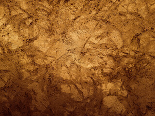 Wall Gold texture. Golden Ore rocks. Stone background. Abstract texture. Rock pile. Stone texture. Structure. Shimmering surface. Precious Foil. Rough structure mineral. Rock texture.