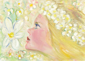 Blond garden fairy with flowers in her hair