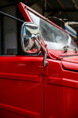 close up shot of antique red car