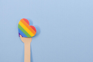 Hands with heart in gay lgbt colors
