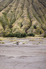 motocross rider in national park. Bromo, Indonesia.