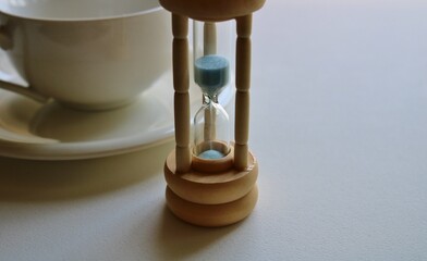 砂時計　ティーカップ　背景　イメージ