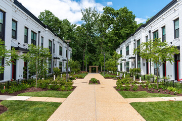 A walkway separates rows of townhouses in Potomac, Montgomery County Maryland.