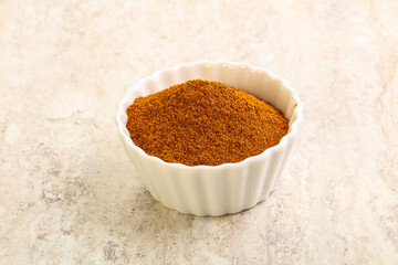 Dry Paprika powder in the bowl