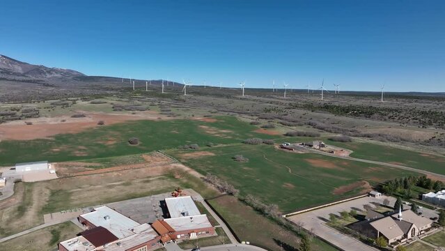 Aerial Monticello Utah homes hospital church pull part 2. Settled in July 1887 by pioneers from The Church of Jesus Christ of Latter-day Saints. Farming, ranching, and uranium mining. Mountain valley.