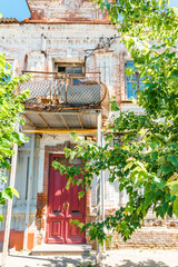 wooden entrance doors of old houses porch and front entrance. vintage architecture and restoration