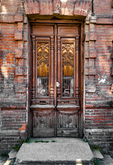 wooden entrance doors of old houses porch and front entrance. vintage architecture and restoration