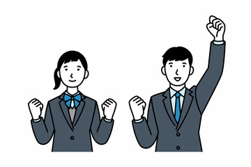 ガッツポーズをする学生