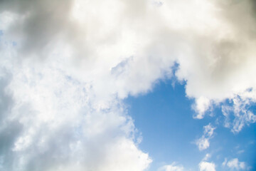 Cumulus clouds. White clouds on a blue background.