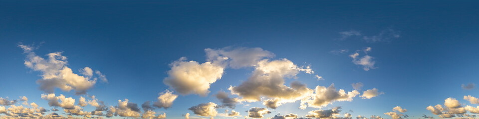 Dark blue sunset sky panorama with Cumulus clouds. Seamless hdr pano in spherical equirectangular format. Complete zenith for 3D visualization, game and sky replacement for aerial drone 360 panoramas.