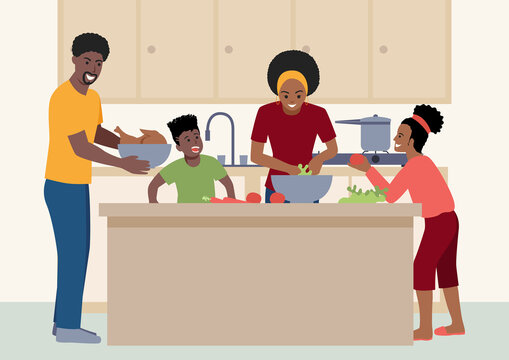 Happy black family having fun cooking at home together