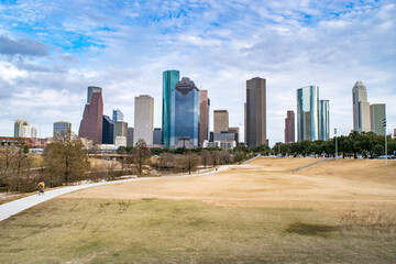Obraz premium Buffalo Bayou Park, Bike Path, and Downtown Houston in the Summer - Houston, Texas, USA