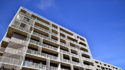 Apartment building with aluminium facades. Modern minimalist architecture. An innovative approach to residential architecture.