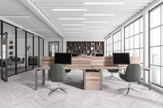 Stylish office interior with coworking and meeting area, panoramic window