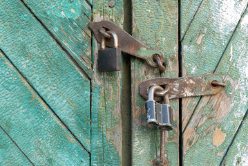 closed wooden door with lock
