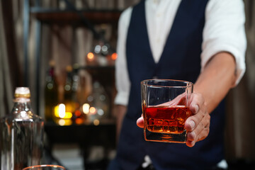 Bartender pouring Whiskey, on  bar,