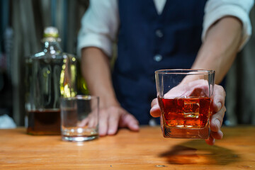 Bartender pouring Whiskey, on  bar,
