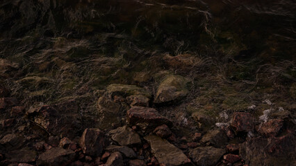 waves hit granite rocks on a coast
