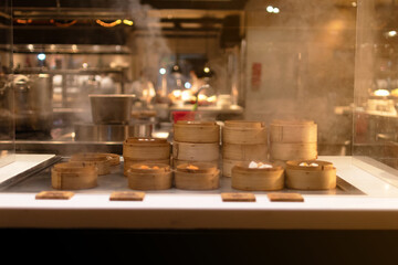 Fototapeta na wymiar Dim sum steamers at Chinese restaurant.