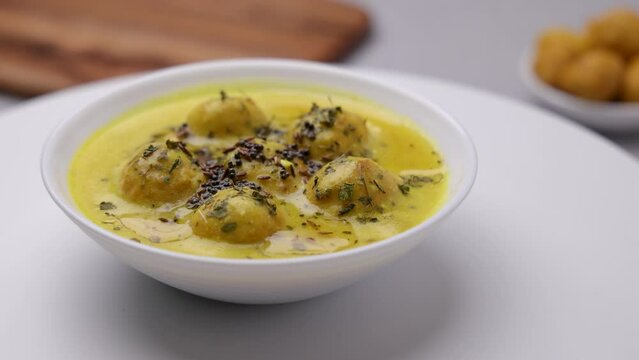 kadhi pakora is ready to serve, tempering with ground spices roasted in desi ghee