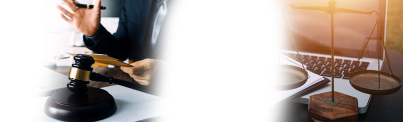 justice and law concept.Male judge in a courtroom on wooden table and Counselor or Male lawyer working in office. Legal law, advice and justice concept.