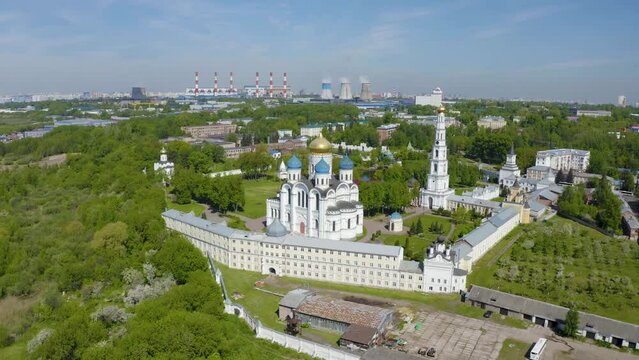 Aerial footage of Nikolo-Ugreshsky monastery on sunny summer day. Dzerzhinsky, Moscow Oblast, Russia.