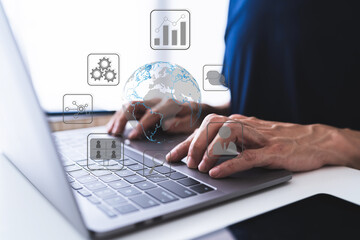 Businessperson using laptop for online business smart working technology at home via cyberspace or...