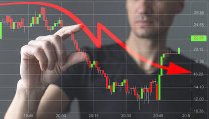 businessman near downfall finance graph, shot on the blue background