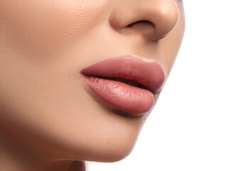 Woman with beautiful lips after permanent makeup procedure on white background, closeup