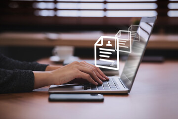 Concept of electronic signature. Woman working on laptop at table, closeup