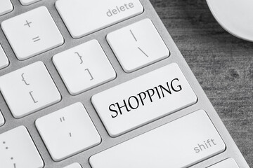 Online store. Button with word SHOPPING on computer keyboard, closeup