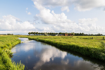 Small river in the Dutch polder landscape. - obrazy, fototapety, plakaty