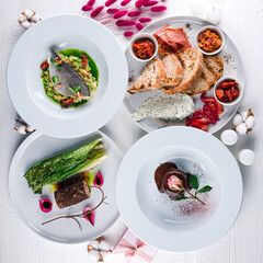 Three dishes from the menu for the restaurant